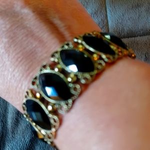 Black and gold tone classy stretch bracelet